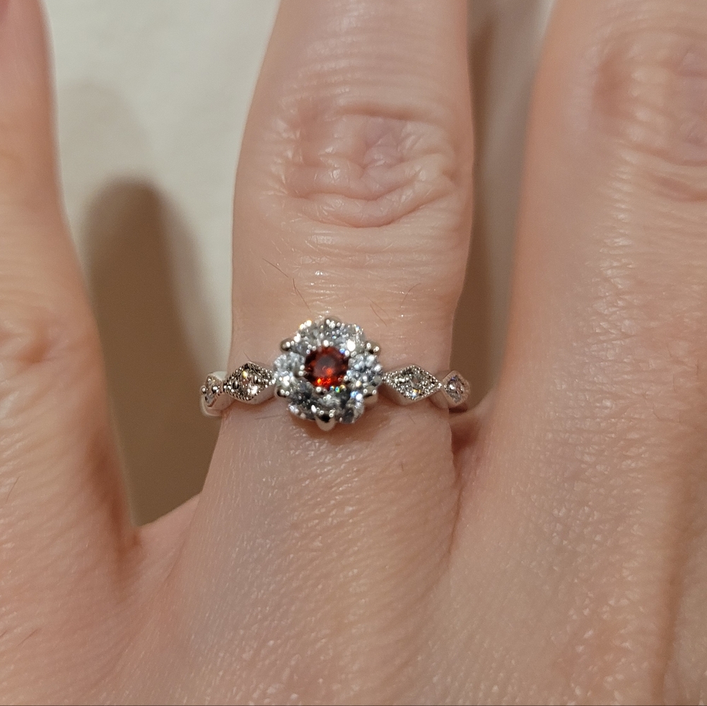 Silver red and clear stone ring